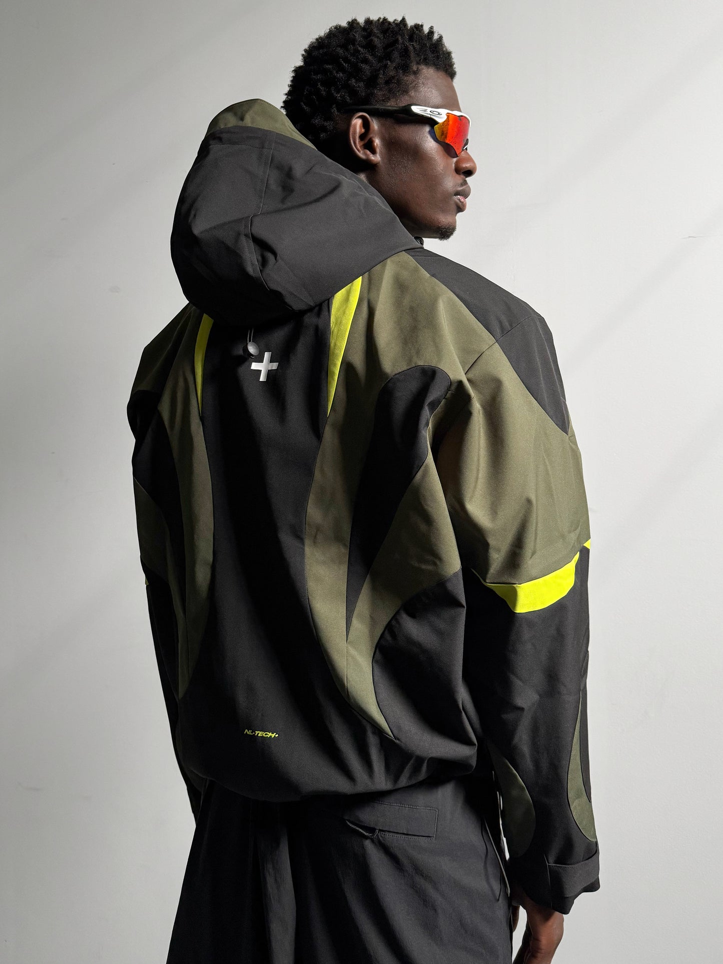 000. OCTO Shell Jacket v2 Olive/Neon