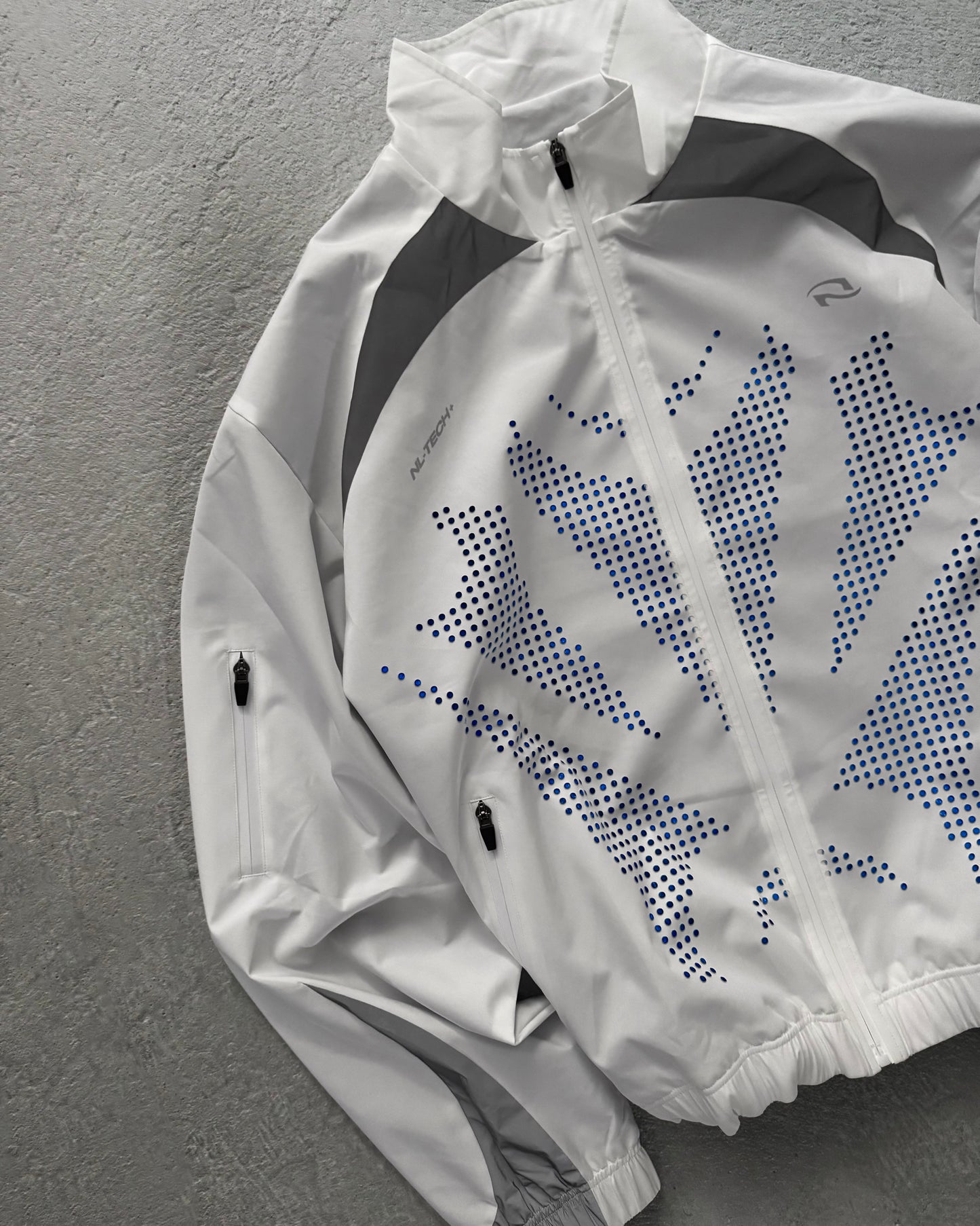 011. PERF Shell Jacket - Titanium White