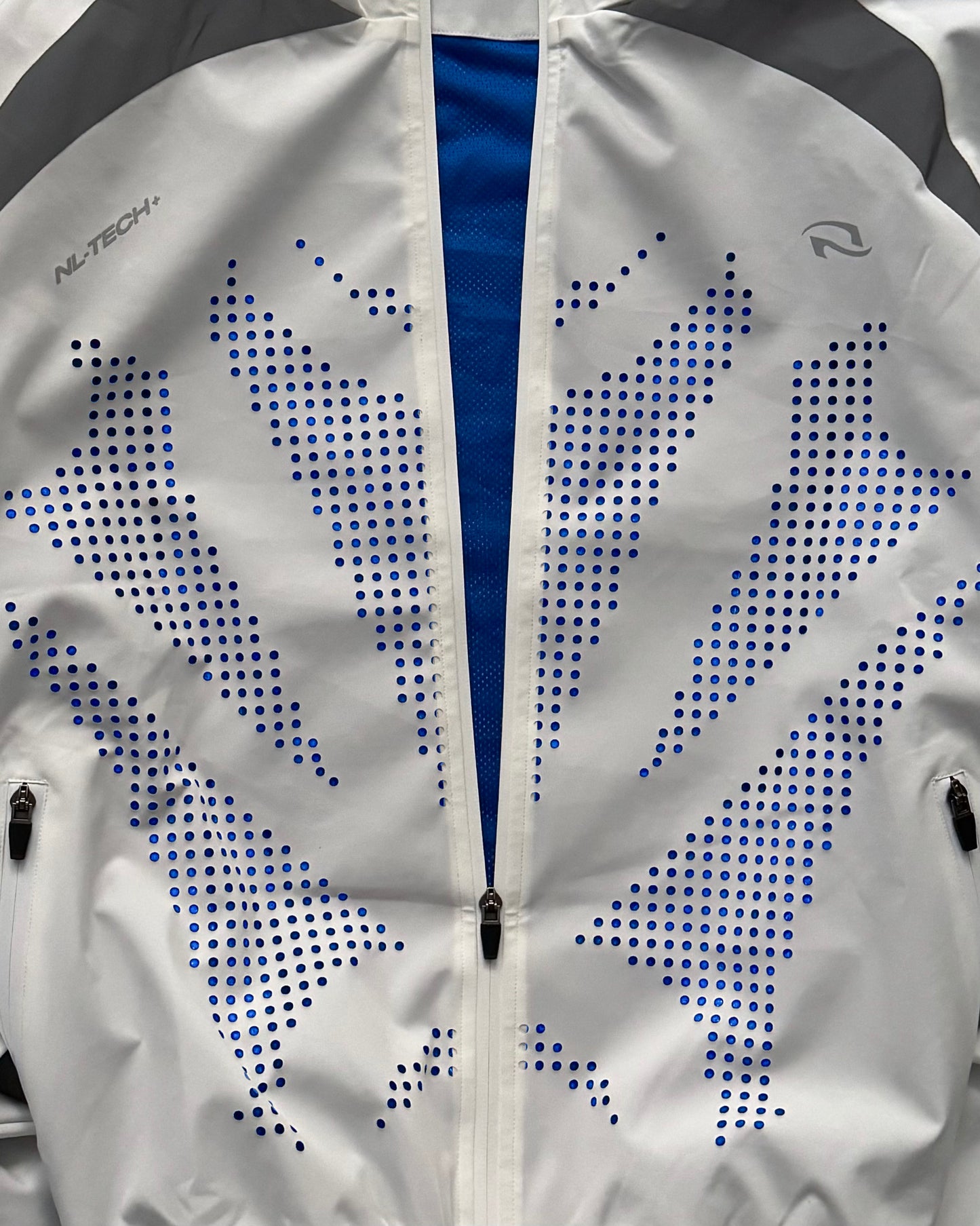 011. PERF Shell Jacket - Titanium White